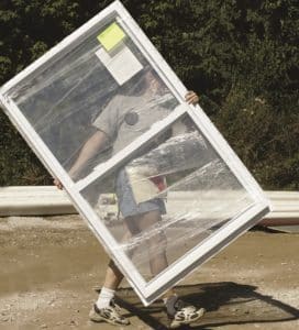 a person holding a new window